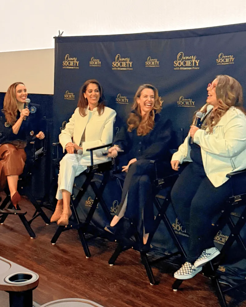 Rhiannon Franz speaking at an Owners Society event